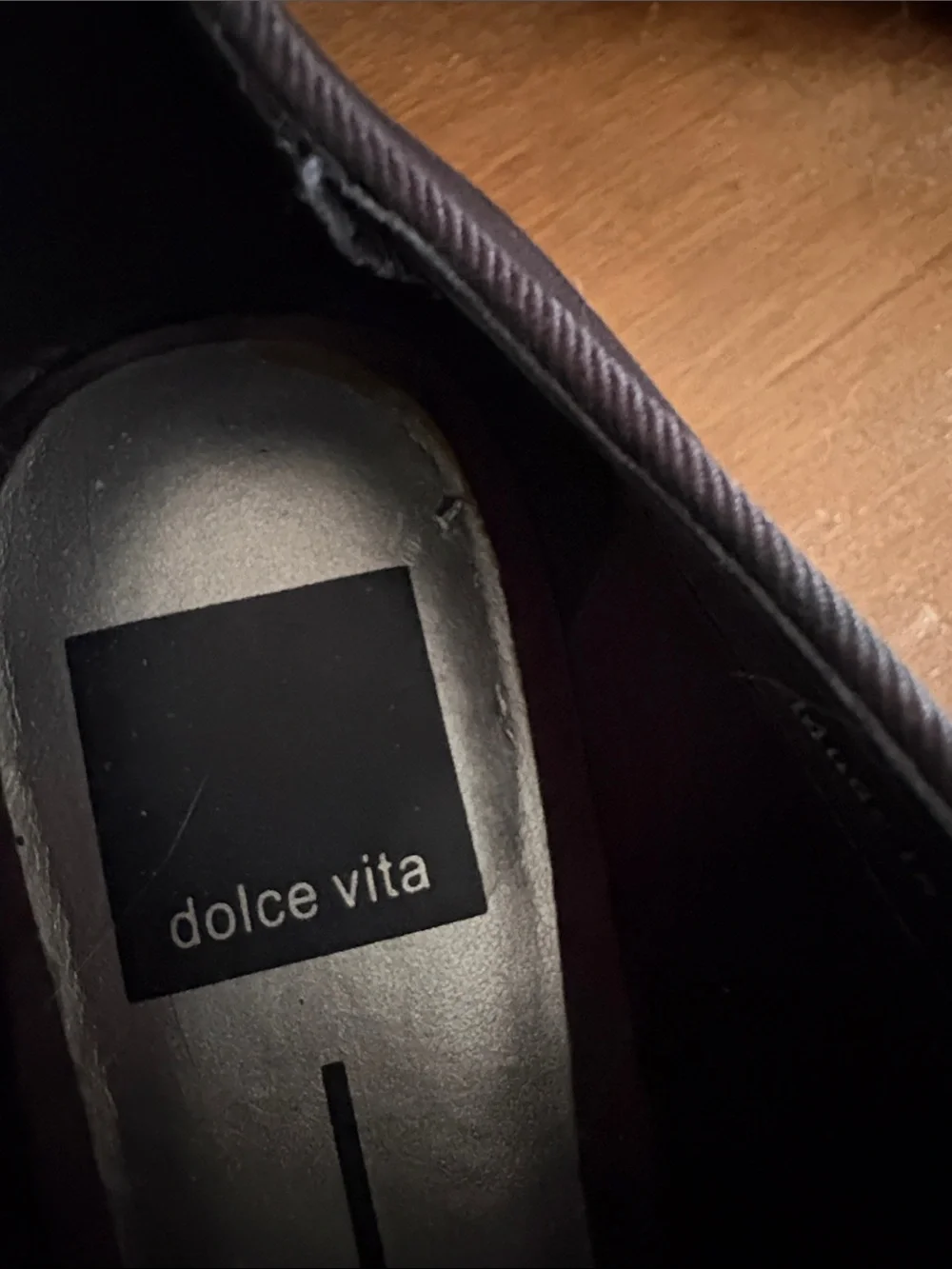Women’s Dolce vita slip on with black leather and silver toe